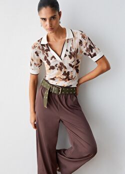 Desenli Polo Yaka Ajur Örme Bluz ürünü görüntülemek için tıklayınız