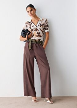 Desenli Polo Yaka Ajur Örme Bluz ürünü görüntülemek için tıklayınız