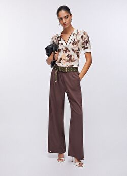 Desenli Polo Yaka Ajur Örme Bluz ürünü görüntülemek için tıklayınız