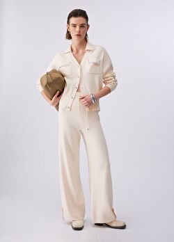 Açık Sarı Açık Yaka Örme Üst ürünü görüntülemek için tıklayınız