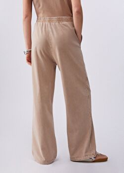 Soluk Renkli, Taş İşlemeli Jarse Pantolon ürünü görüntülemek için tıklayınız